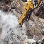 Integrated Hydraulic Rock Drill and Splitter excavator mounted drilling and splitting machine job site